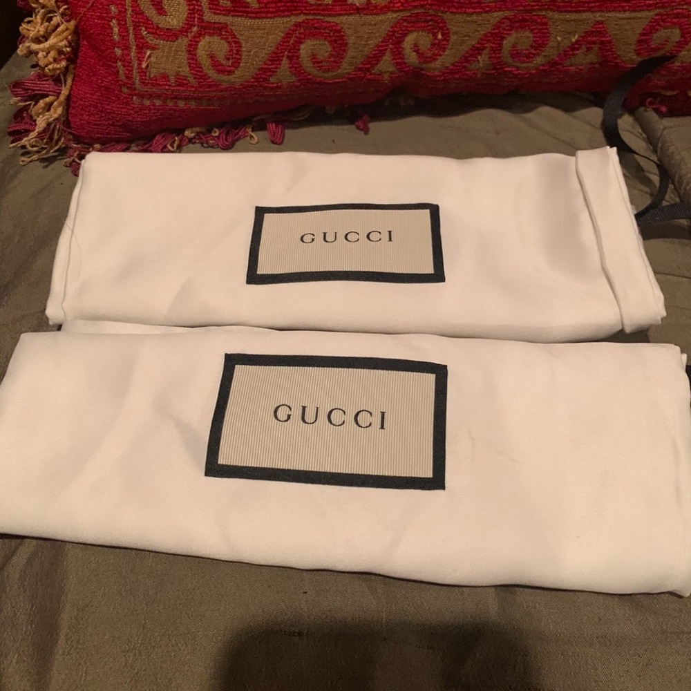 Gucci dust  bags. White fabric with black accents. Ideal for shoes